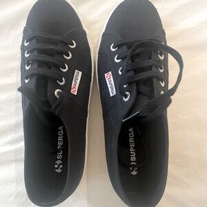 Superga 2790 Platform sneakers black
Brand new never worn.
7 1/2US
38 EU